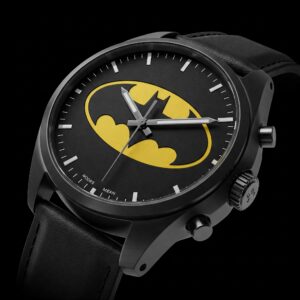The iconic Batman logo featured on the face of a watch, symbolizing the superhero's strength and determination.