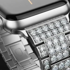 "Close-up view of precision-set diamonds on a silver diamond Apple Watch band, highlighting their sparkle."