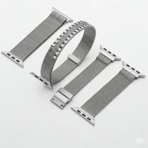 "Various silver apple watch band styles including mesh, link bracelet, and milanese loop."