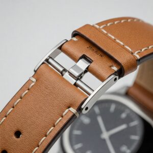 Detail of a 21mm watch strap with a convenient quick-release spring bar mechanism.