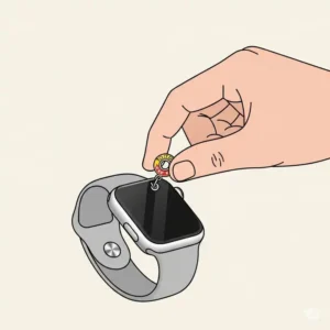 Hand attaching a small charm to an Apple Watch band, demonstrating the simple process of adding apple watch charms.