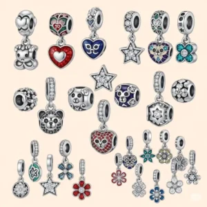 Collection of apple watch charms made from diverse materials including sterling silver, enamel, and cubic zirconia.
