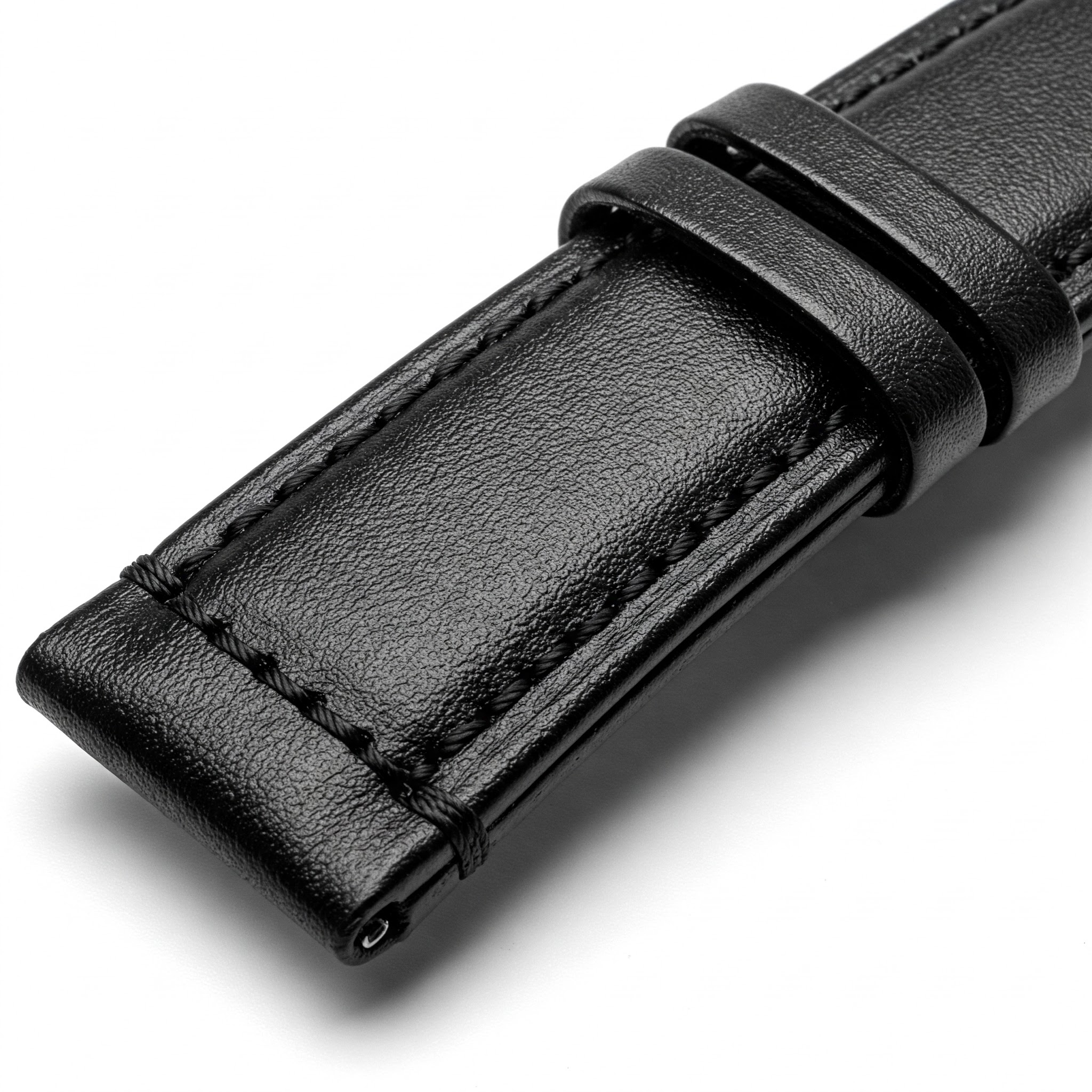 A classic black leather watch strap with visible stitching detail.