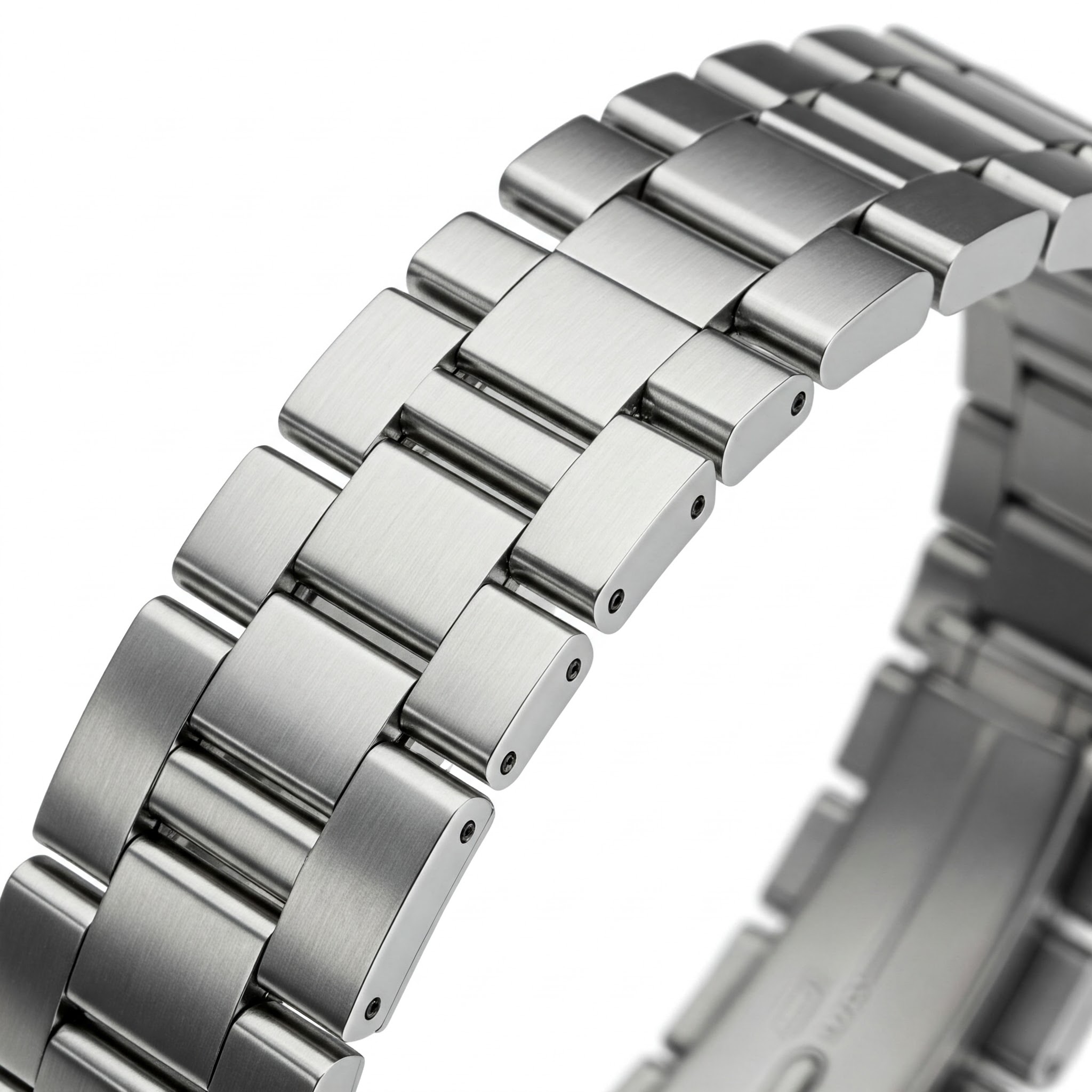 Close-up of a ss watch band extension, showing the connection mechanism.