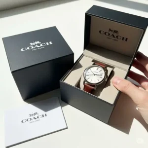 Coach men's gold bracelet watch presented in its premium brand packaging, ready for gifting or unboxing. Shop coach gold bracelet watch men's for the perfect gift.