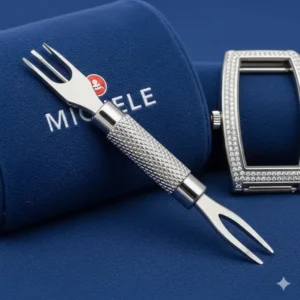 A small, specialized tool used for safely removing the old Michele watch band replacement tool.