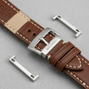 A close-up of a high-quality leather Michele watch band replacement.