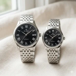 A classic set of matching watches for couples with complementary black dials and stainless steel bracelets.